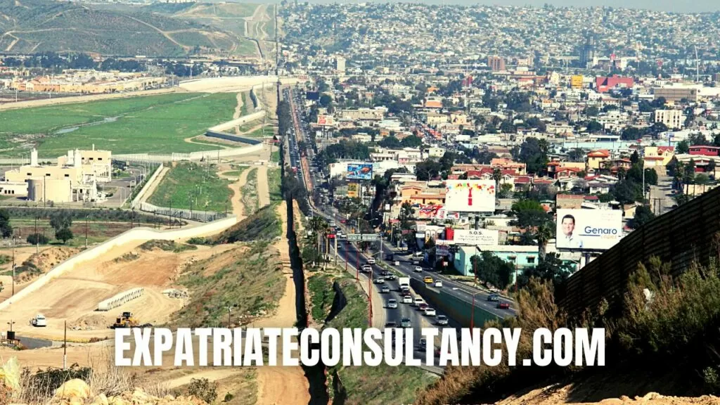 Immigrant Adaptation in 2026 3 USA and Mexico fence border. Many immigrants cross between the USA and Mexico and must pass through adaptation to a new culture.