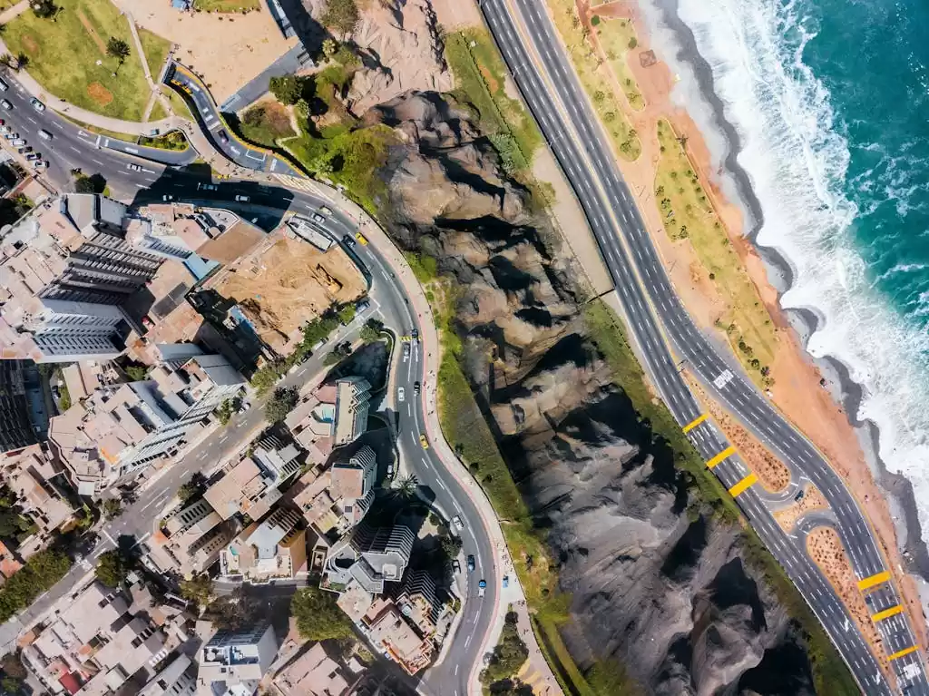 Aerial perspective showcasing the urban landscape and coastline of Miraflores, Lima, Peru, one of our Warm Winter Destinations.