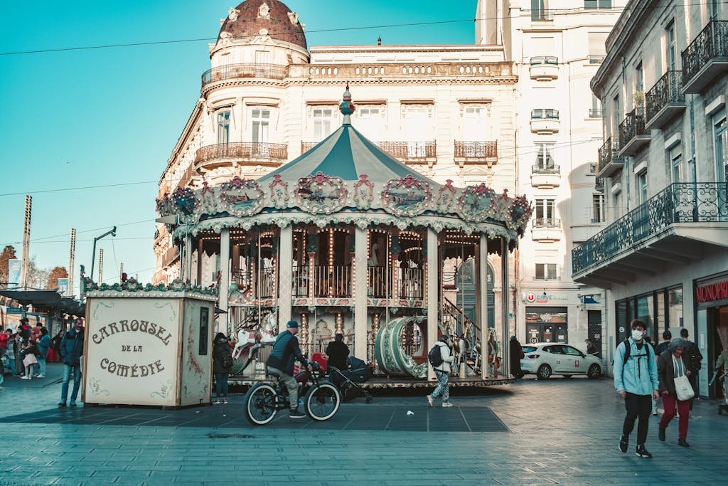 Lively scene of the Carrousel de la Comédie in Montpellier, France's bustling downtown.